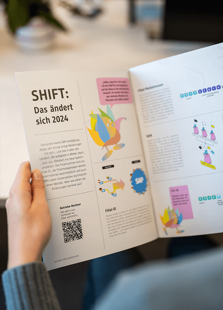 Doppelseite im Mitarbeitermagazin mit Infos zur Systemumstellung